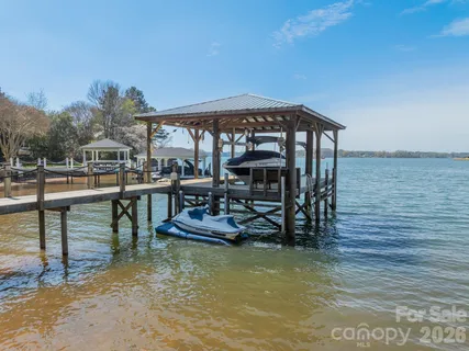 a view of a swimming pool with chairs