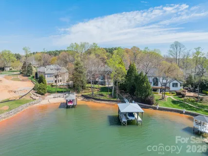 a view of a lake with a yard