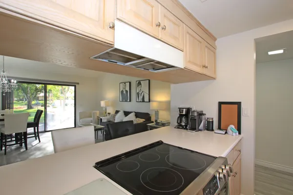 a kitchen with a table and chairs