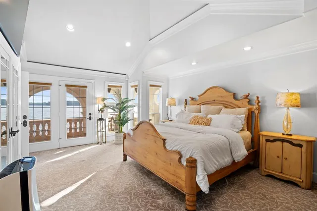 a porch with furniture and a large window