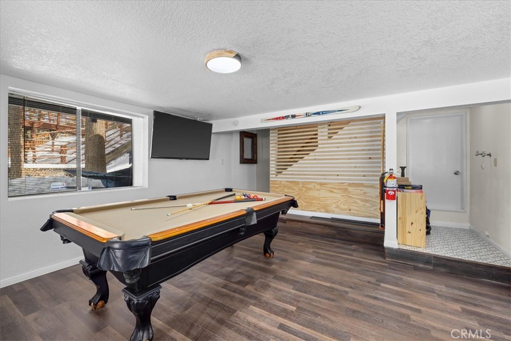 113 East Fairway Boulevard Big Bear City, CA 92314 - Photo 30 of 36 a room with pool table and windows
