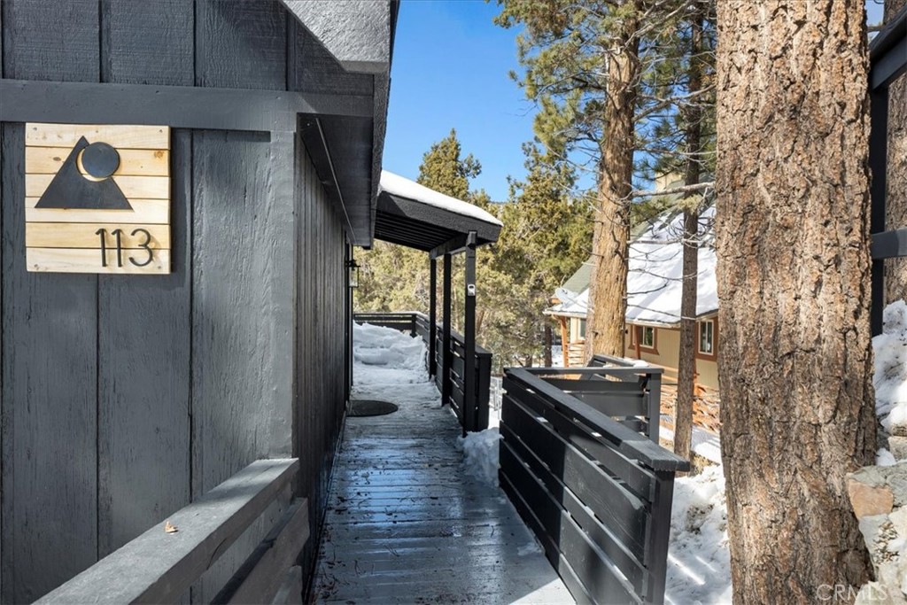 113 East Fairway Boulevard Big Bear City, CA 92314 - Photo 3 of 36 a kitchen with stainless steel appliances granite countertop a stove and a refrigerator