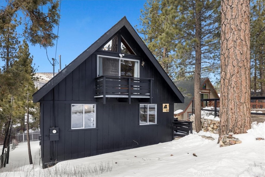 113 East Fairway Boulevard Big Bear City, CA 92314 - Photo 33 of 36 a view of a house with a yard