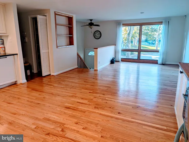 a view of a livingroom with wooden floor