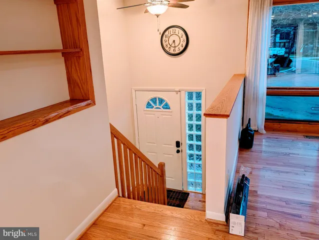 a view of entryway with wooden floor
