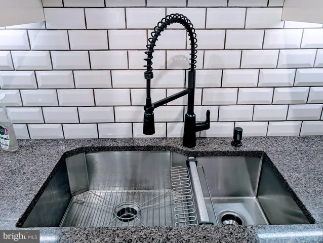 a close view of sink and mirror