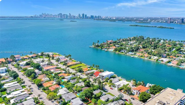 a view of a lake with a table and a chair