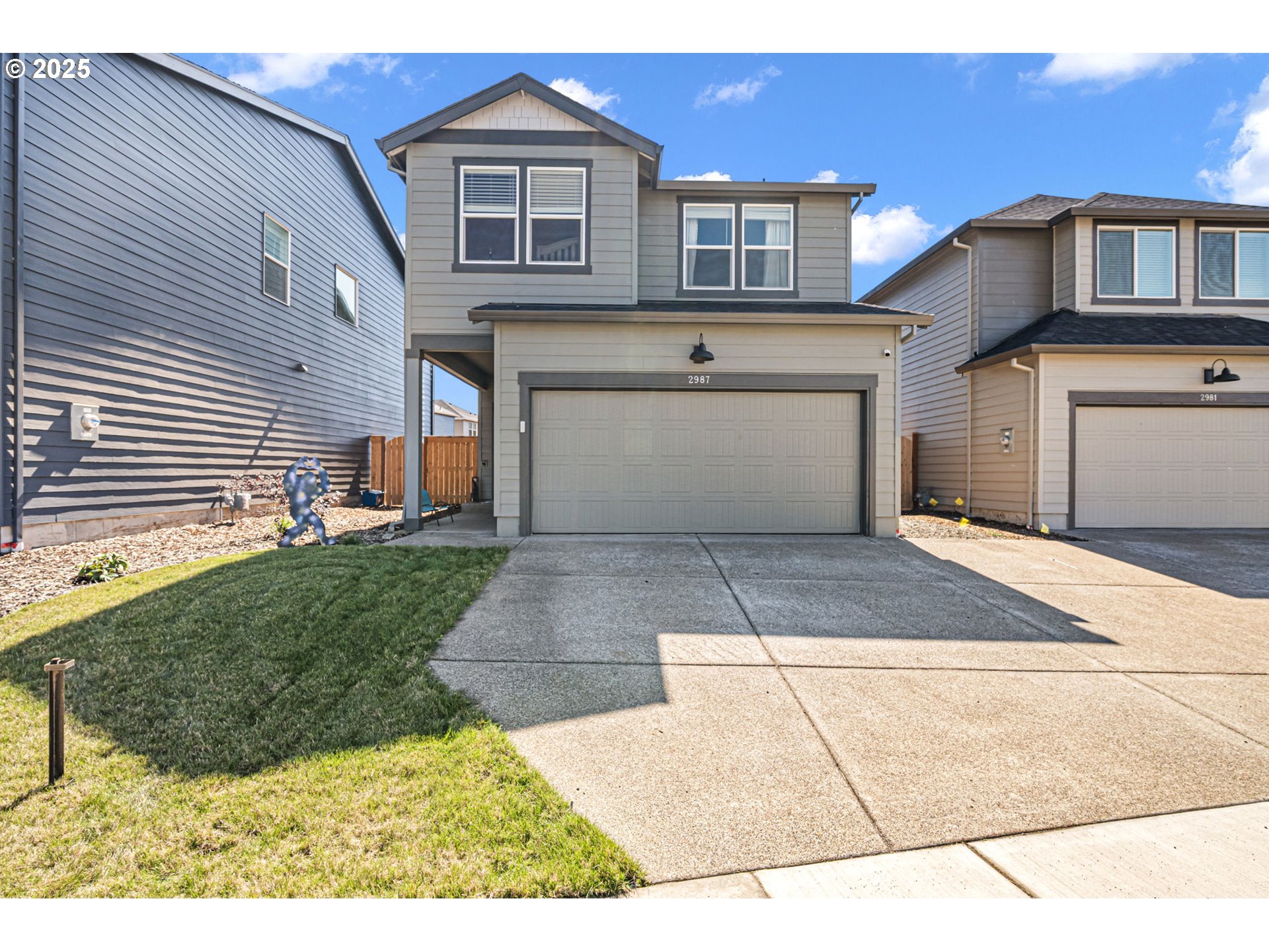 2987 V Street Springfield, OR 97477 - Photo 1 of 45 a front view of a house with a yard