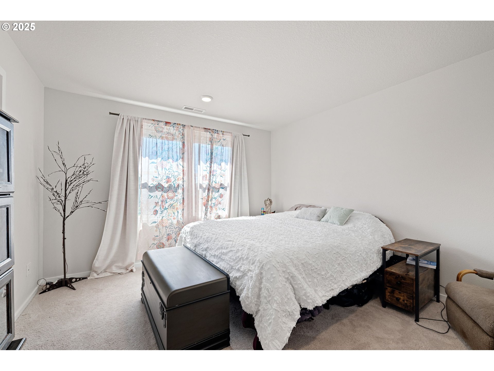 2987 V Street Springfield, OR 97477 - Photo 22 of 45 a bedroom with a bed window and a night stand