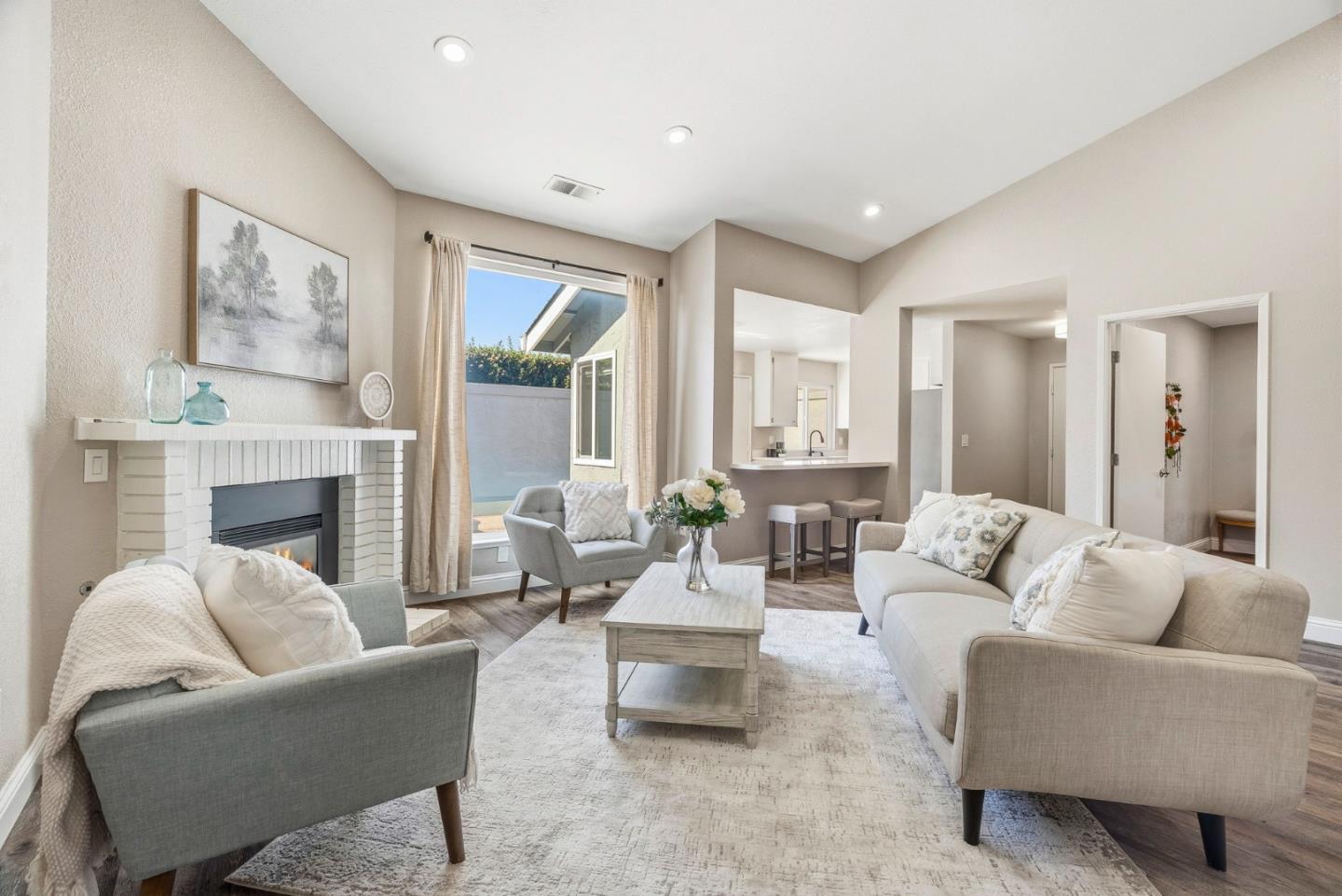 297 Perch Way Aptos, CA 95003 - Photo 15 of 42 a living room with furniture and a fireplace