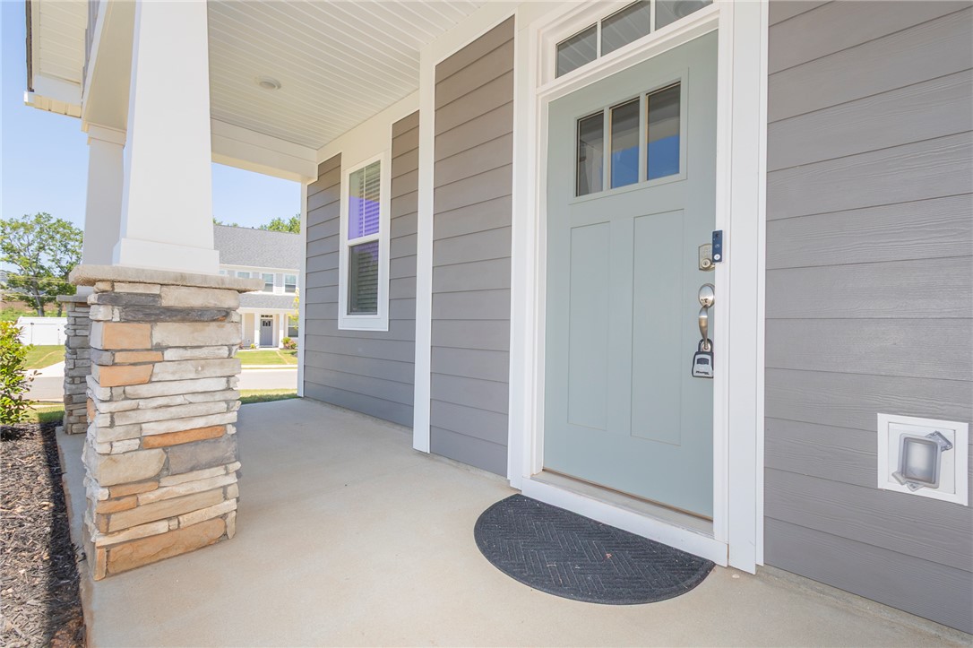607 WH Kay Lane Anderson, SC 29621 - Photo 47 of 48 A welcoming covered porch with a stone pillar, ready to greet you home.