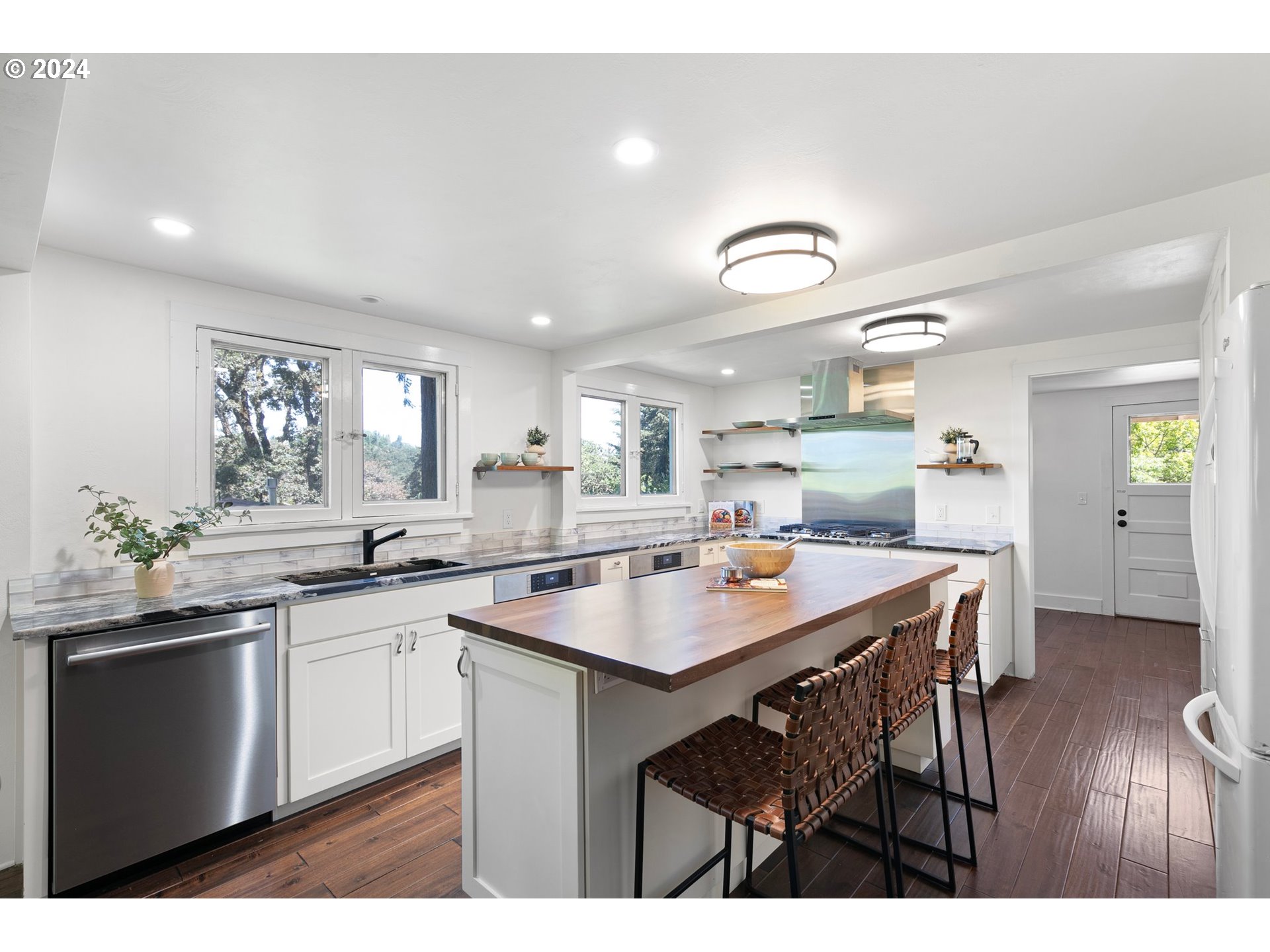 2919 Jefferson Street Eugene, OR 97405 - Photo 12 of 38 a kitchen with a sink and cabinets
