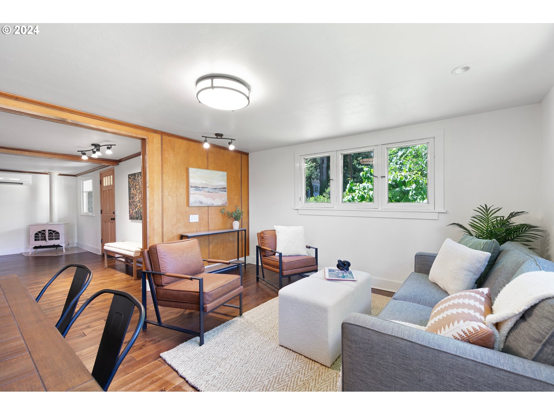 2919 Jefferson Street Eugene, OR 97405 - Photo 8 of 38 a living room with furniture and a large window