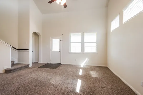 an empty room with windows