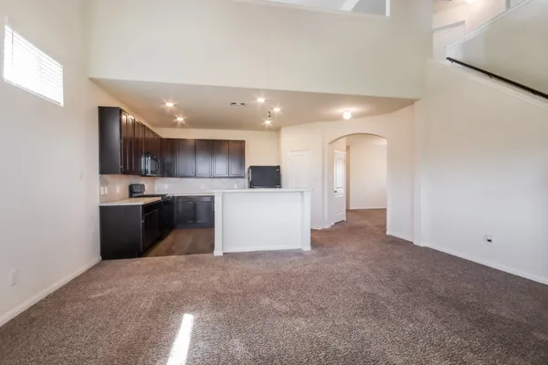 a view of a kitchen with a sink