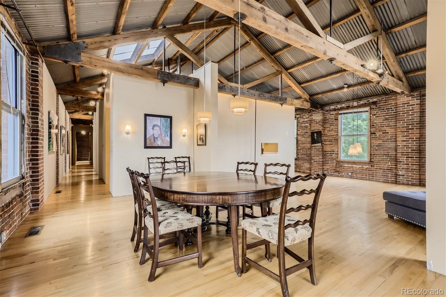 3349 Blake Street Denver, CO 80205 - Photo 14 of 28 a view of a dining room with furniture