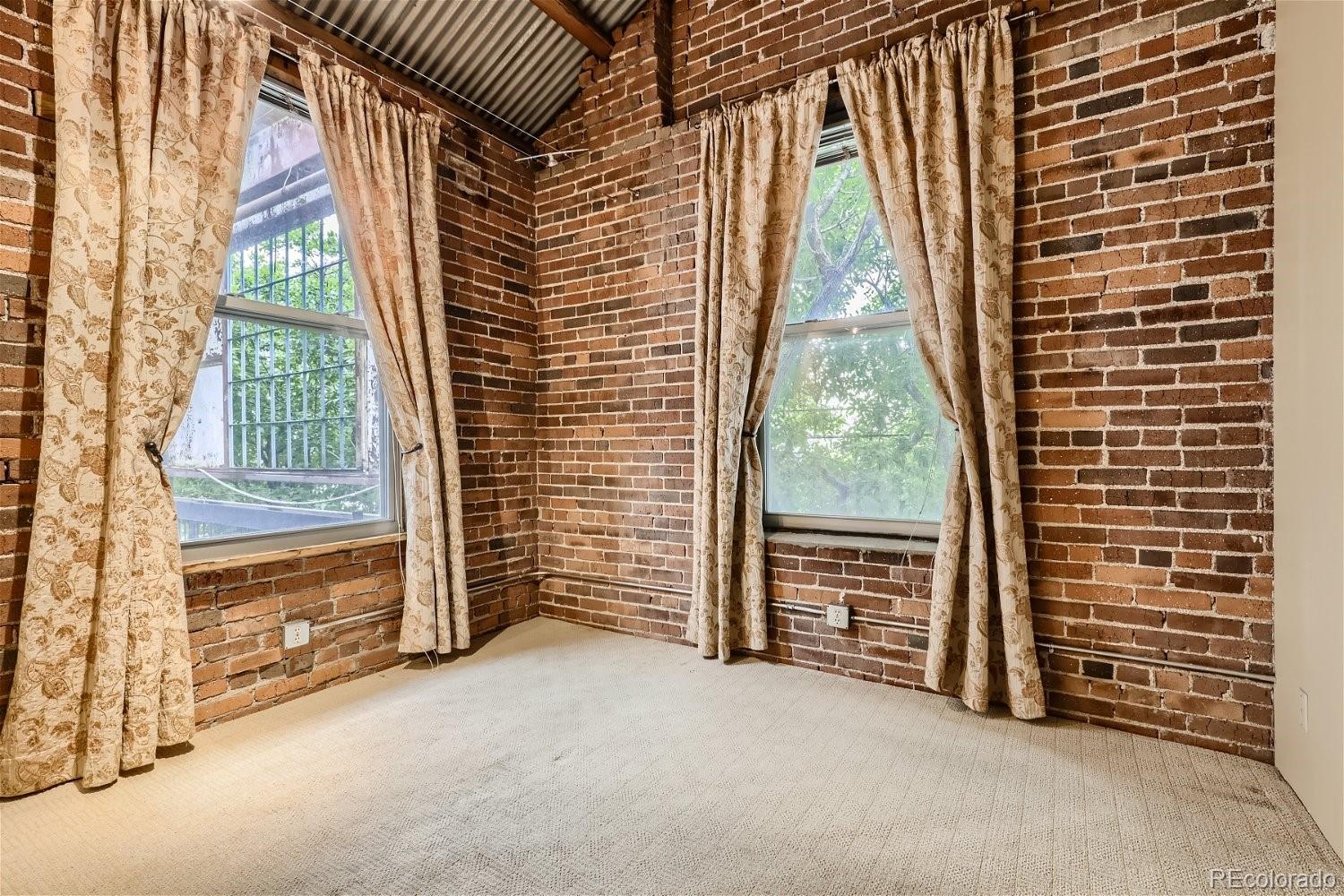 3349 Blake Street Denver, CO 80205 - Photo 24 of 28 a view of a room with a large window