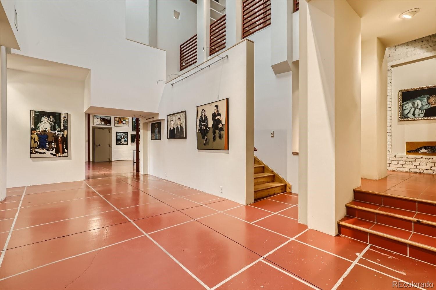 3349 Blake Street Denver, CO 80205 - Photo 3 of 28 a view of an entryway with wooden floor