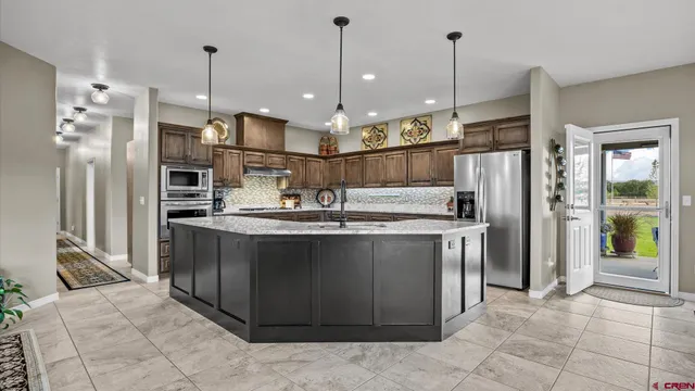 a living room with furniture rug and window