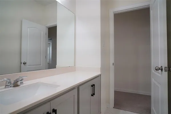 an empty room with closet area