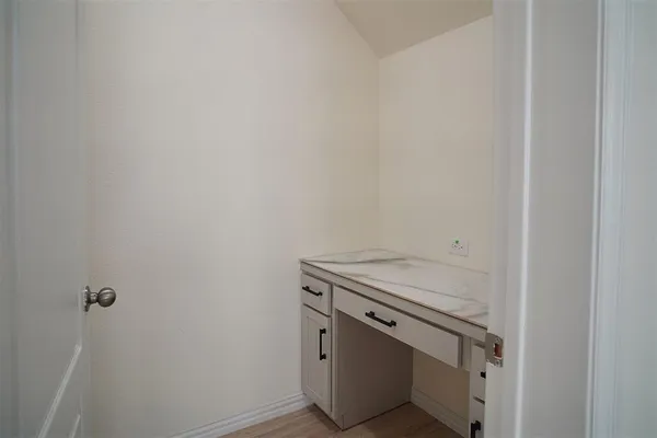 a kitchen with stainless steel appliances sink stove microwave and cabinets