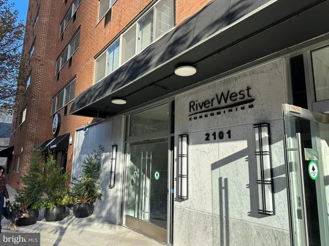 a front view of a building with a glass door