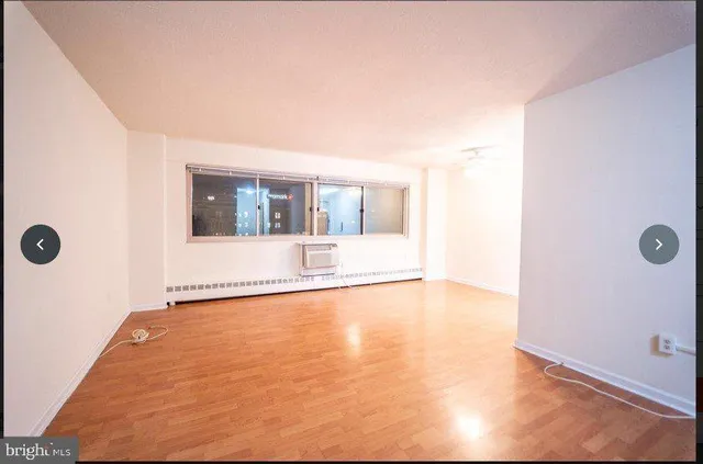 view of an empty room with a window