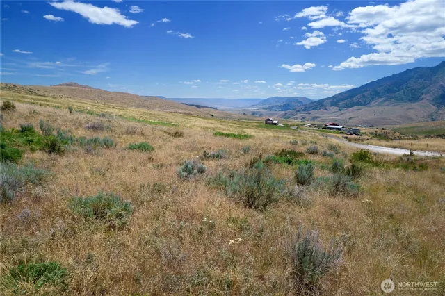 a view of a mountain view of mountains and in the background
