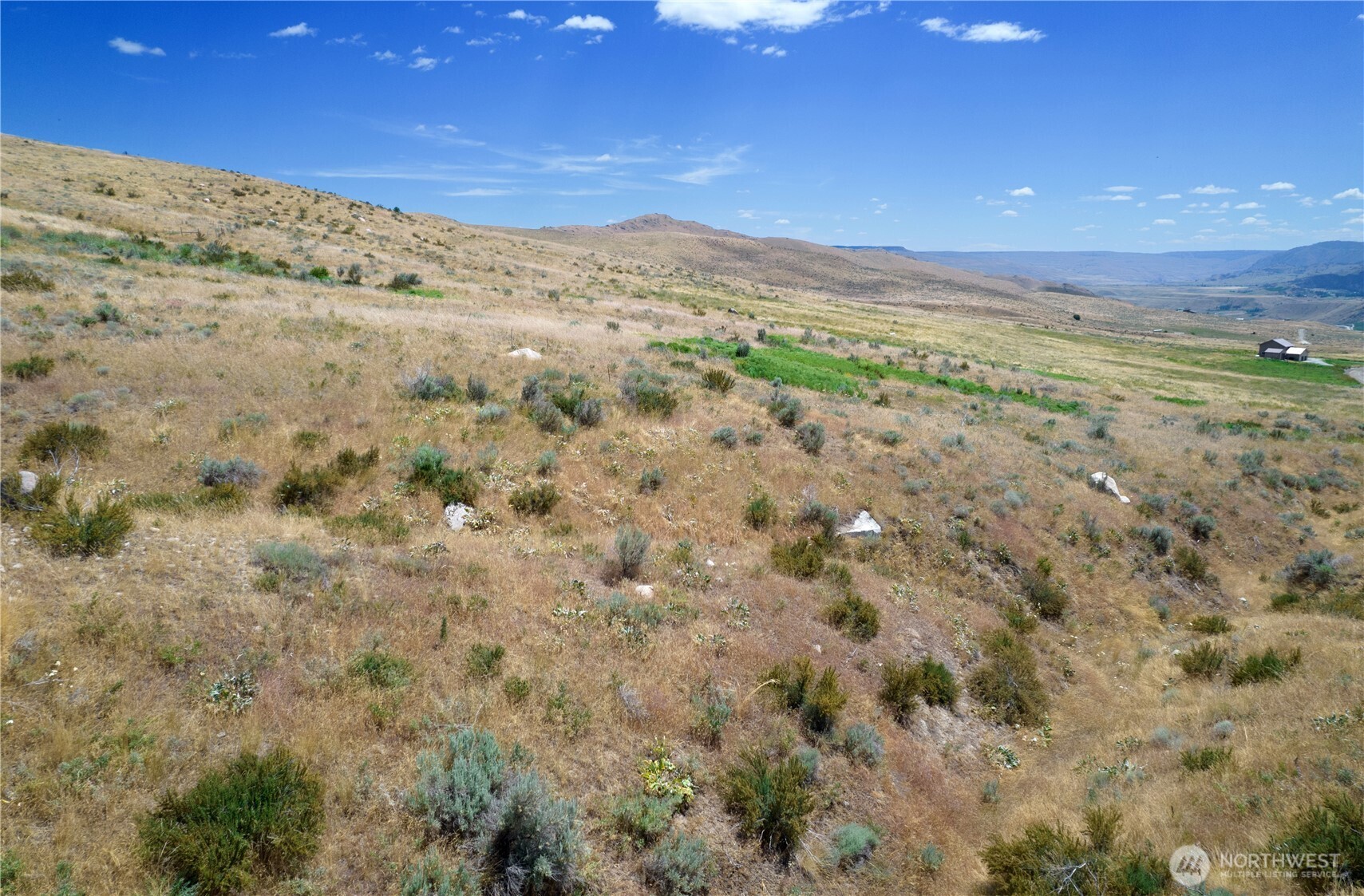 0 Bill Shaw Road Pateros, WA 98846 - Photo 12 of 32 a view of a mountain view of mountains and in the background