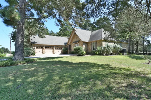 a front view of a house with a garage
