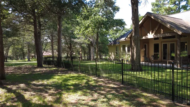 a dining room with furniture window and wooden floor