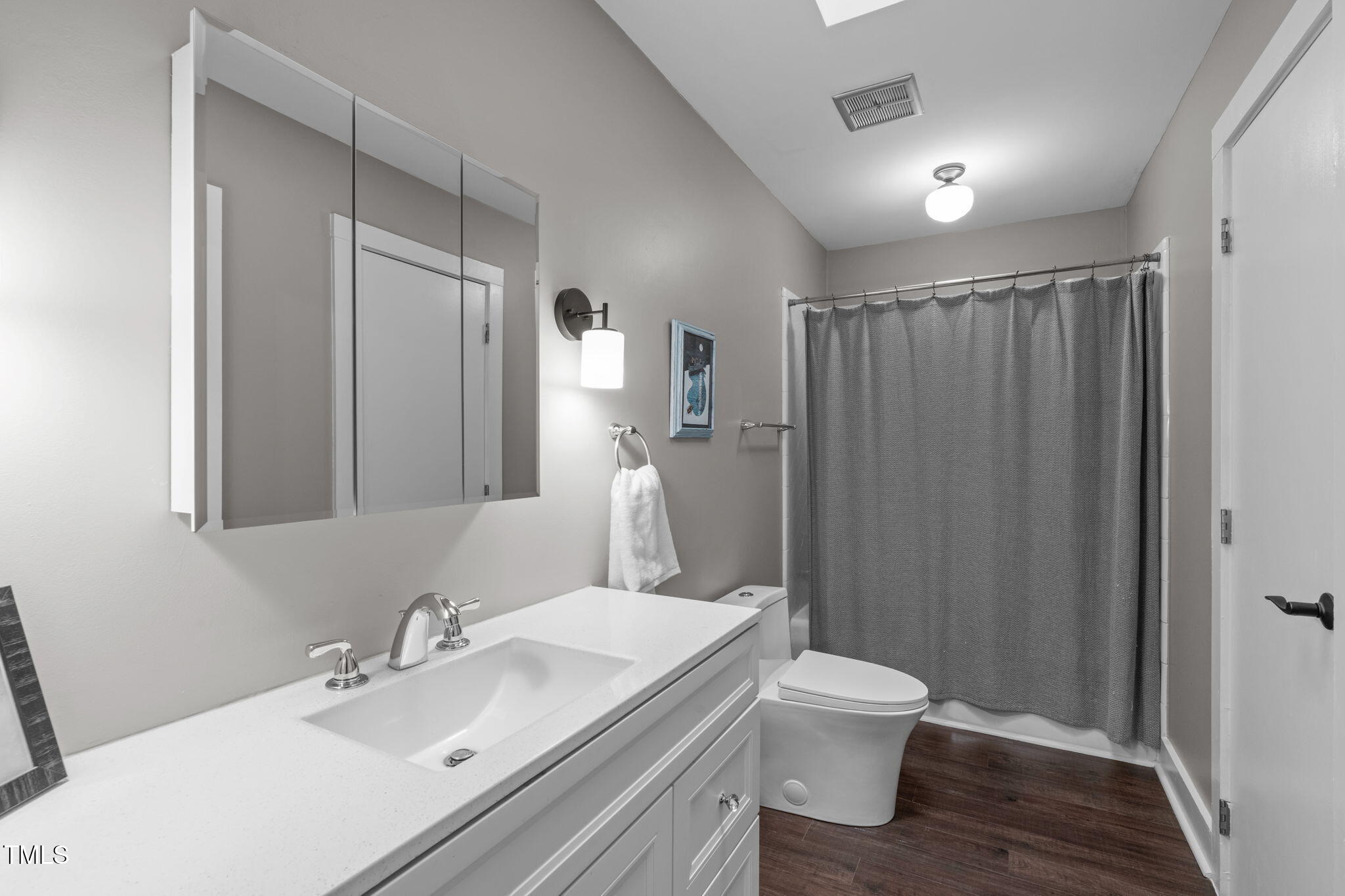 7304 St Ledger Drive Raleigh, NC 27613 - Photo 13 of 29 a bathroom with a sink toilet and shower