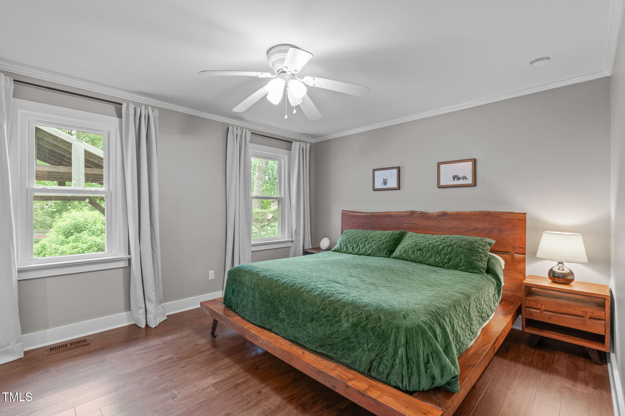 7304 St Ledger Drive Raleigh, NC 27613 - Photo 14 of 29 a bedroom with a bed and window