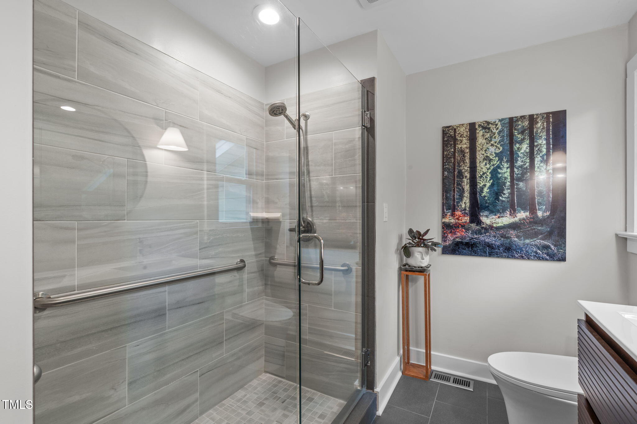 7304 St Ledger Drive Raleigh, NC 27613 - Photo 16 of 29 a bathroom with a shower