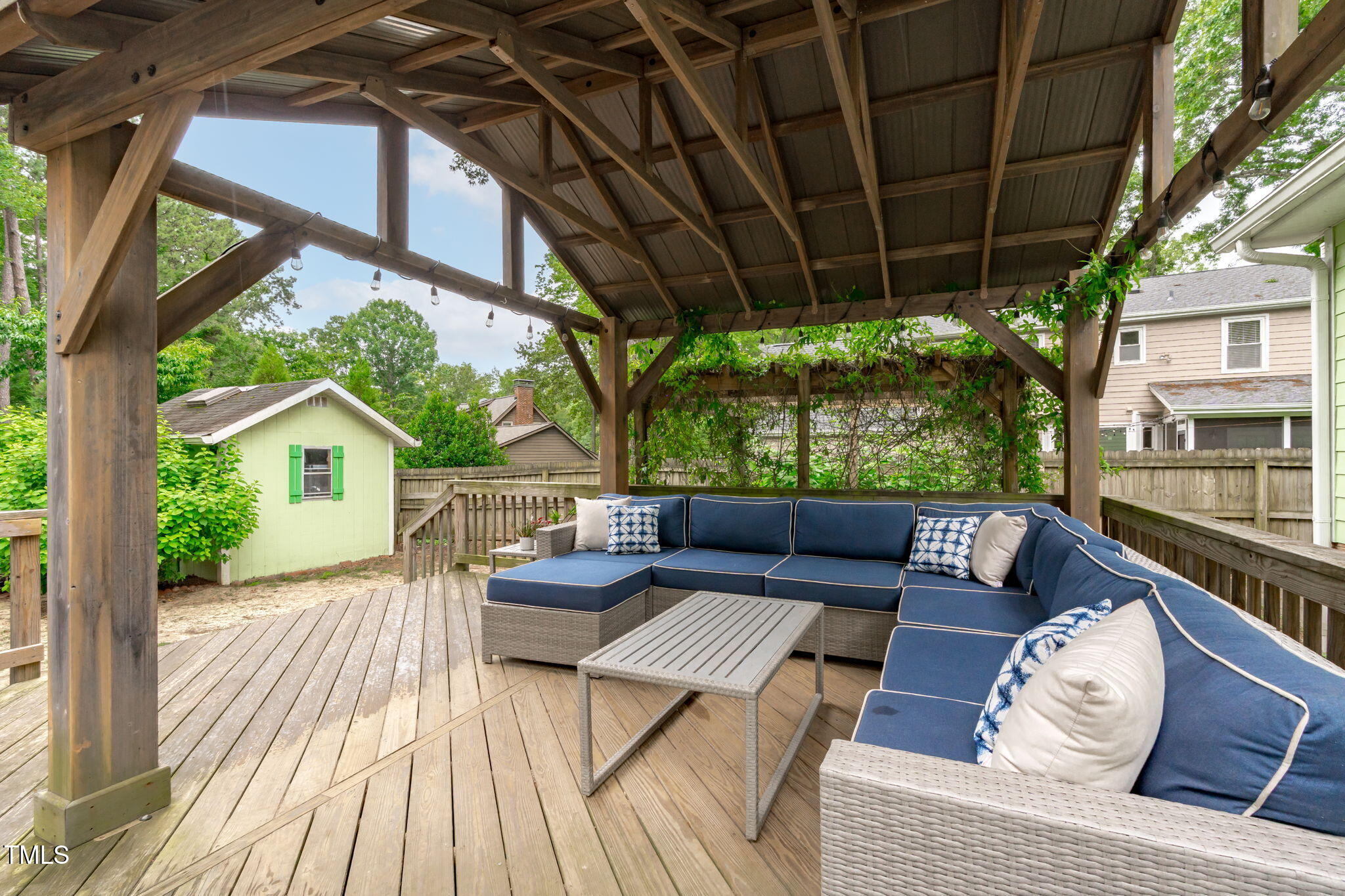 7304 St Ledger Drive Raleigh, NC 27613 - Photo 21 of 29 a view of a couches in patio of a house
