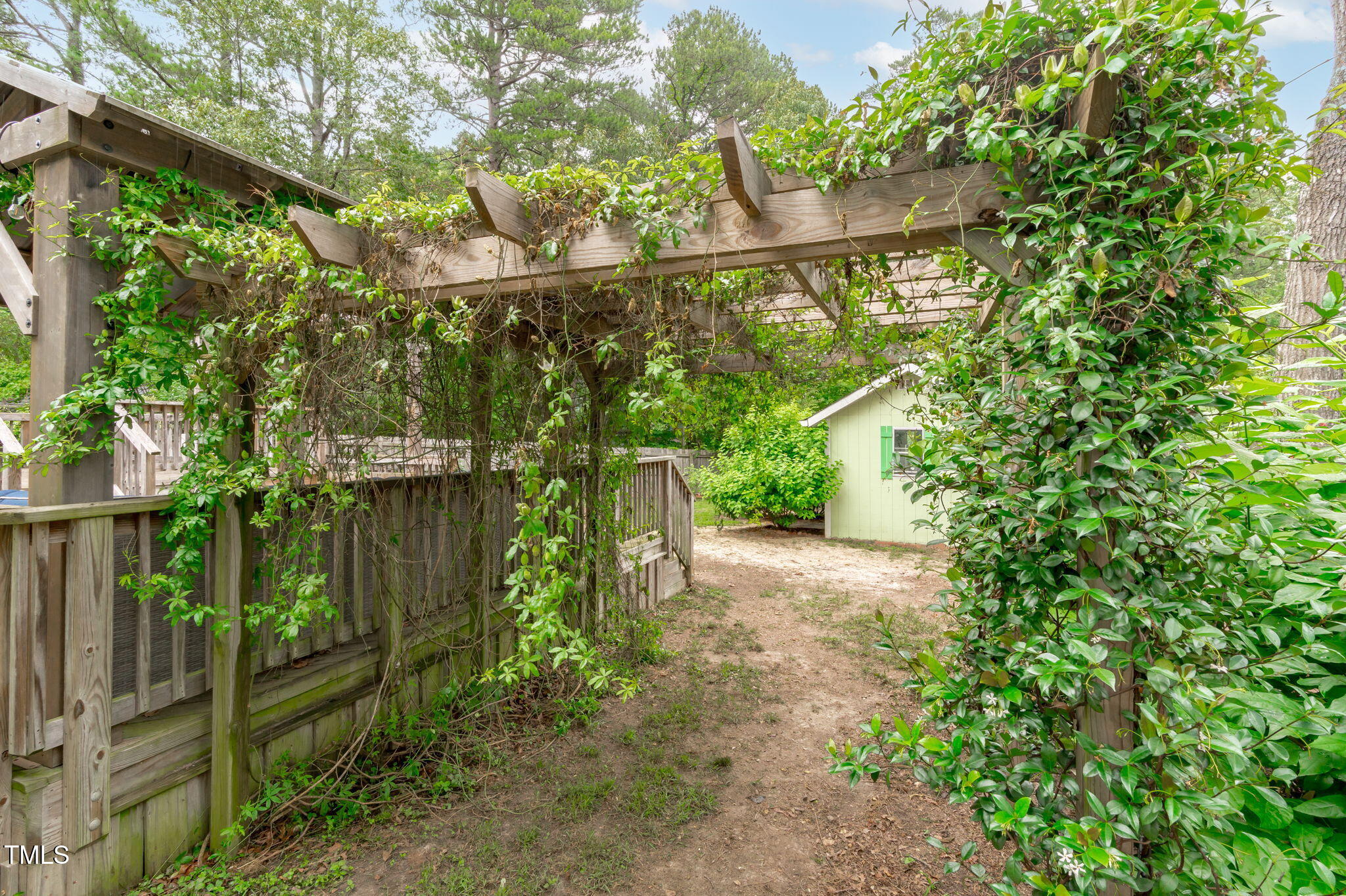 7304 St Ledger Drive Raleigh, NC 27613 - Photo 25 of 29 a backyard of a house with lots of green space