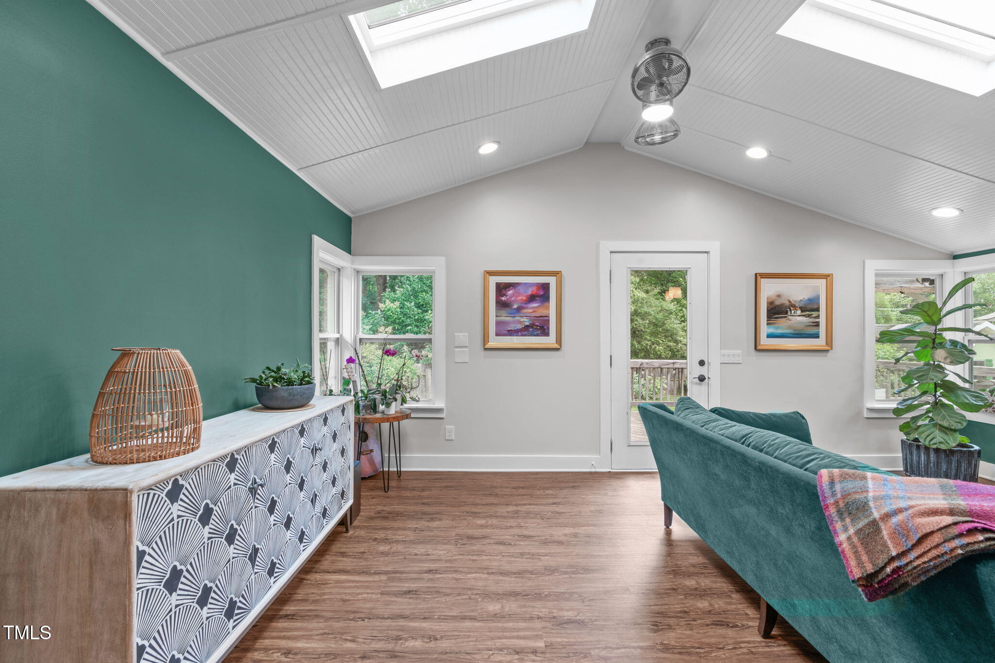 7304 St Ledger Drive Raleigh, NC 27613 - Photo 9 of 29 a living room with furniture and a wooden floor