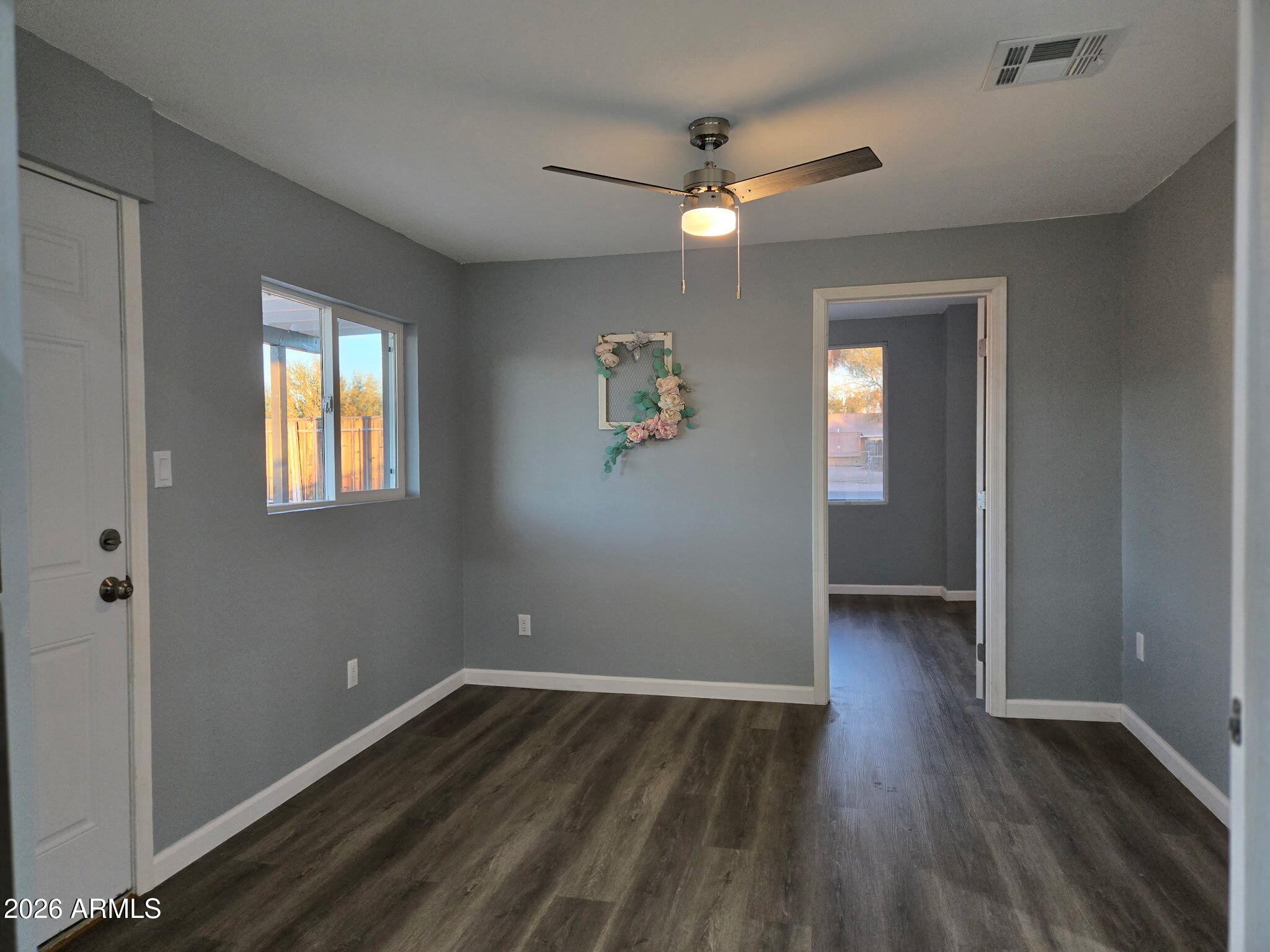 770 South Pinal Drive Apache Junction, AZ 85120 - Photo 19 of 51 wooden floor in an empty room with a window