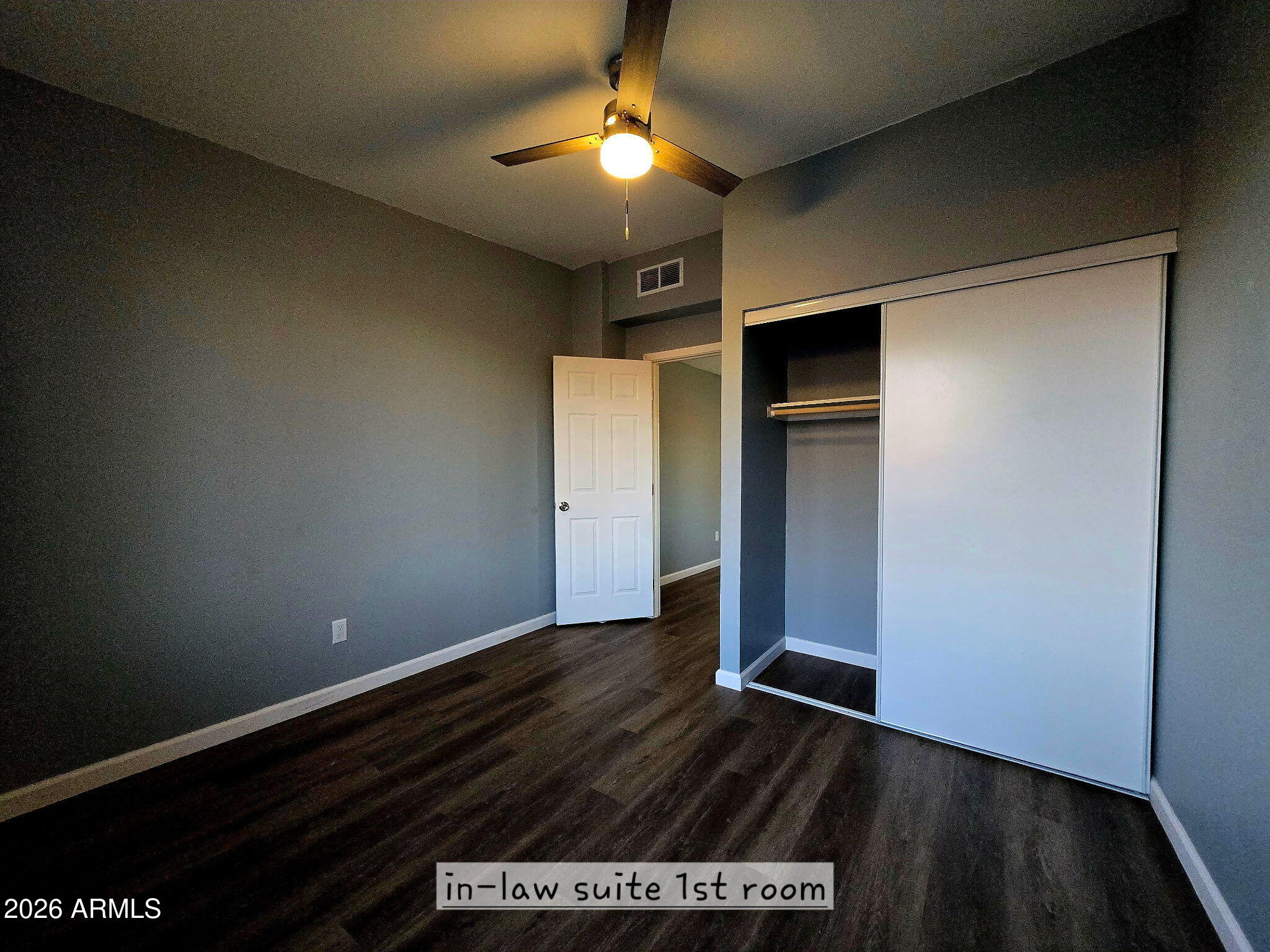 770 South Pinal Drive Apache Junction, AZ 85120 - Photo 24 of 51 a view of empty room with wooden floor