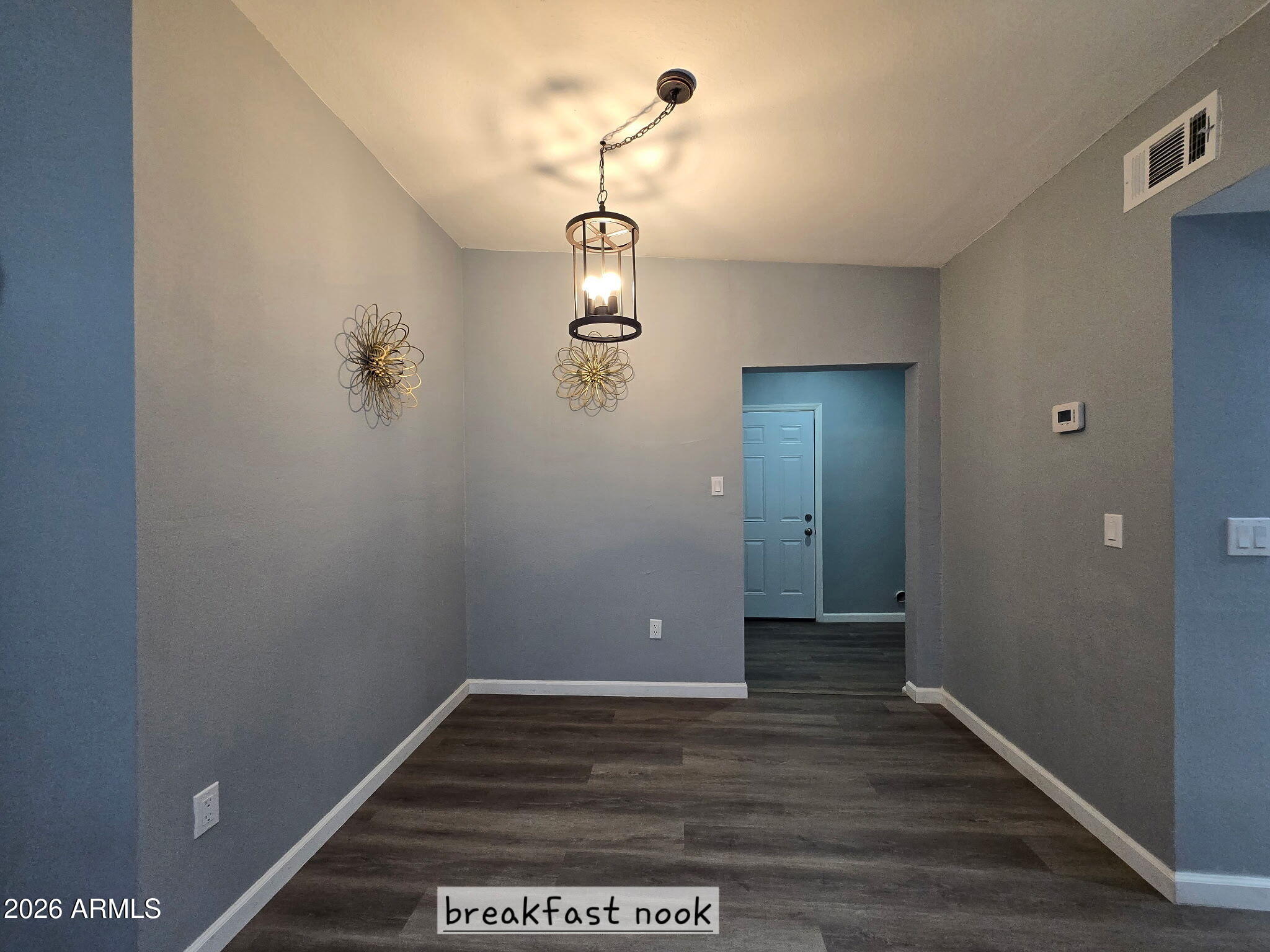 770 South Pinal Drive Apache Junction, AZ 85120 - Photo 28 of 51 a view of a hallway with wooden floor