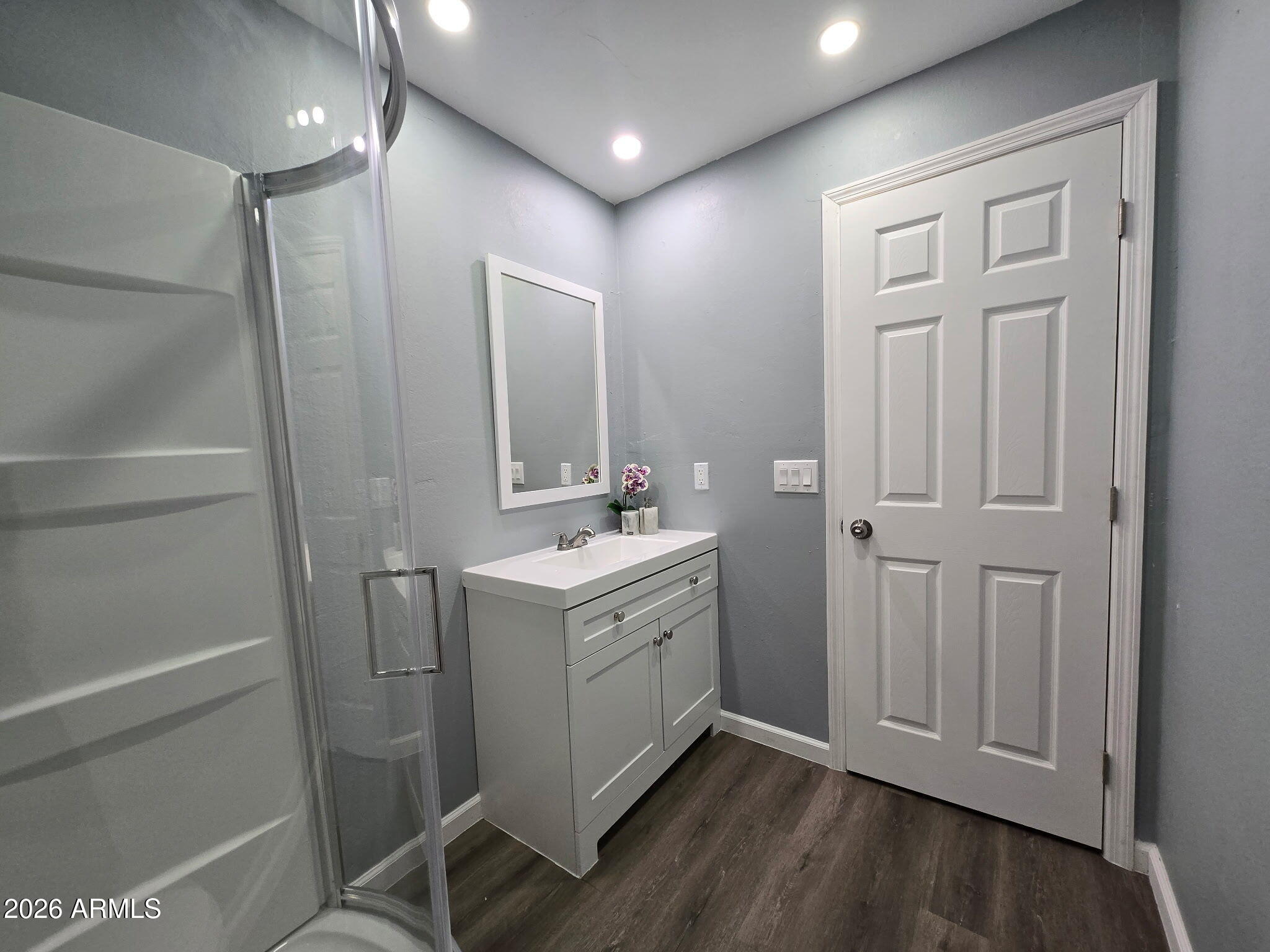 770 South Pinal Drive Apache Junction, AZ 85120 - Photo 37 of 51 a bathroom with a double vanity sink and a mirror