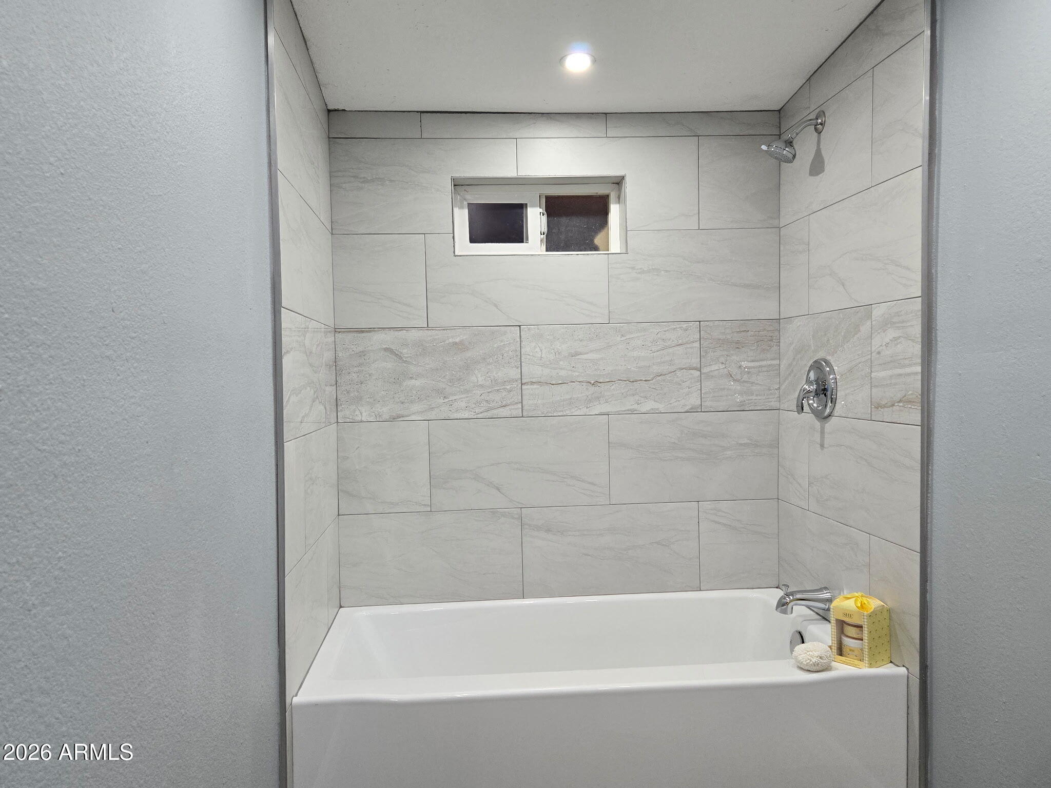 770 South Pinal Drive Apache Junction, AZ 85120 - Photo 42 of 51 a bathroom with a bathtub and a shower