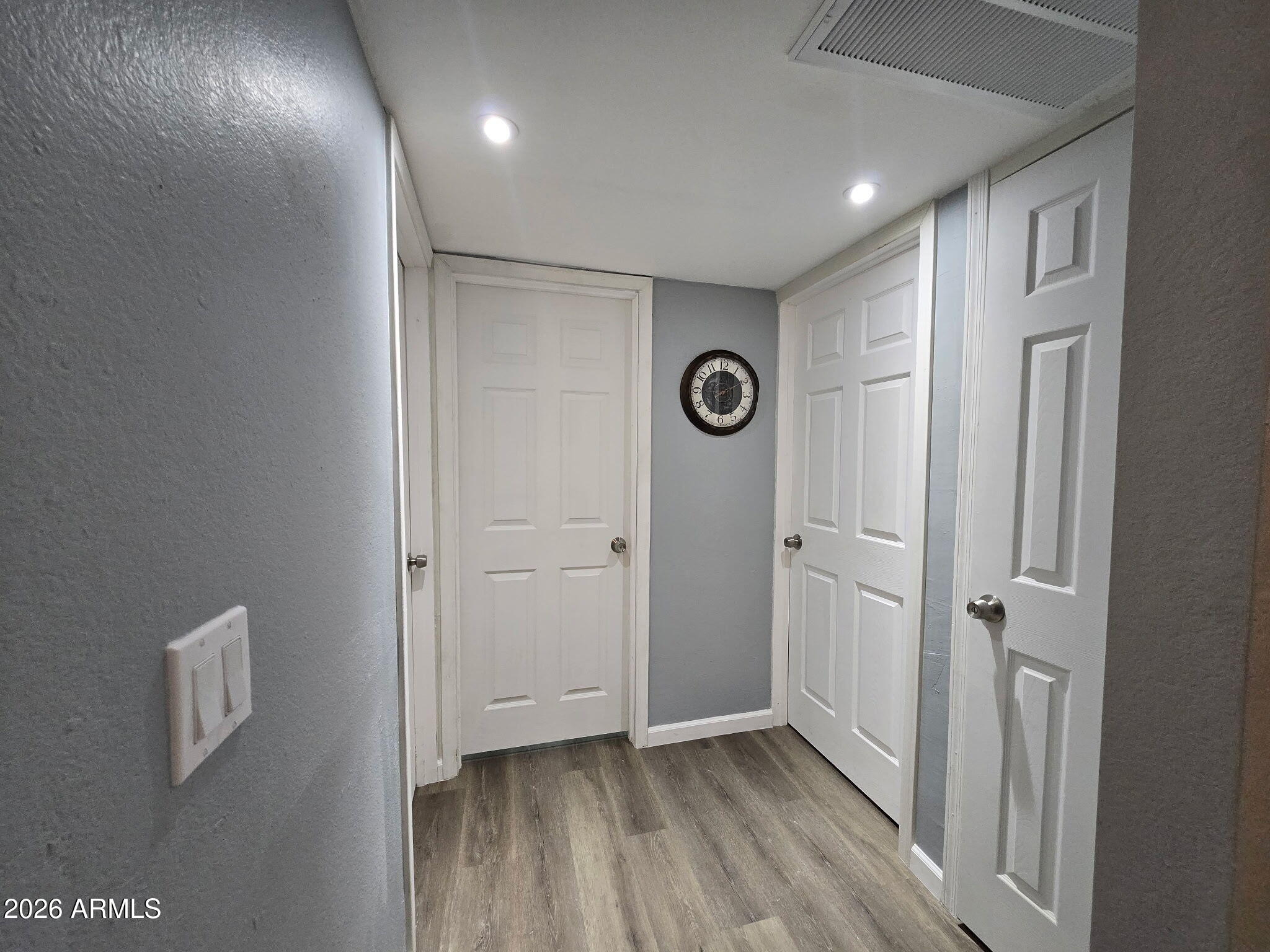 770 South Pinal Drive Apache Junction, AZ 85120 - Photo 47 of 51 a view of a hallway with wooden floor