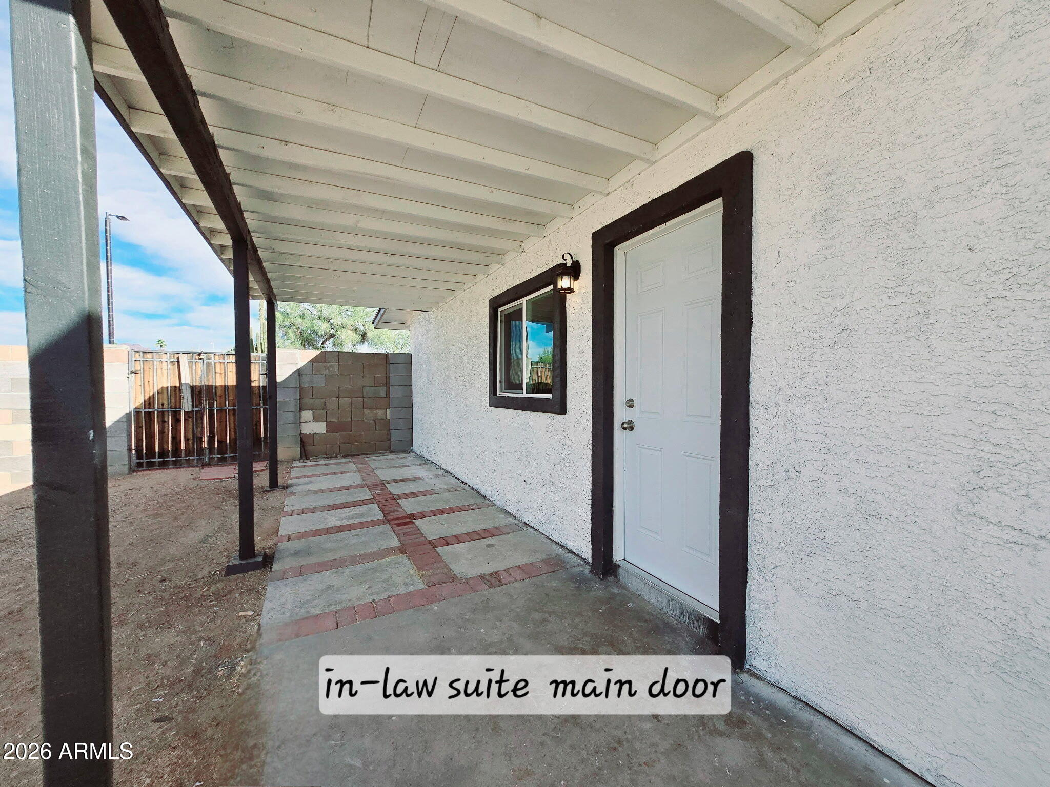 770 South Pinal Drive Apache Junction, AZ 85120 - Photo 9 of 51 a view of a hallway with wooden floor and a rug