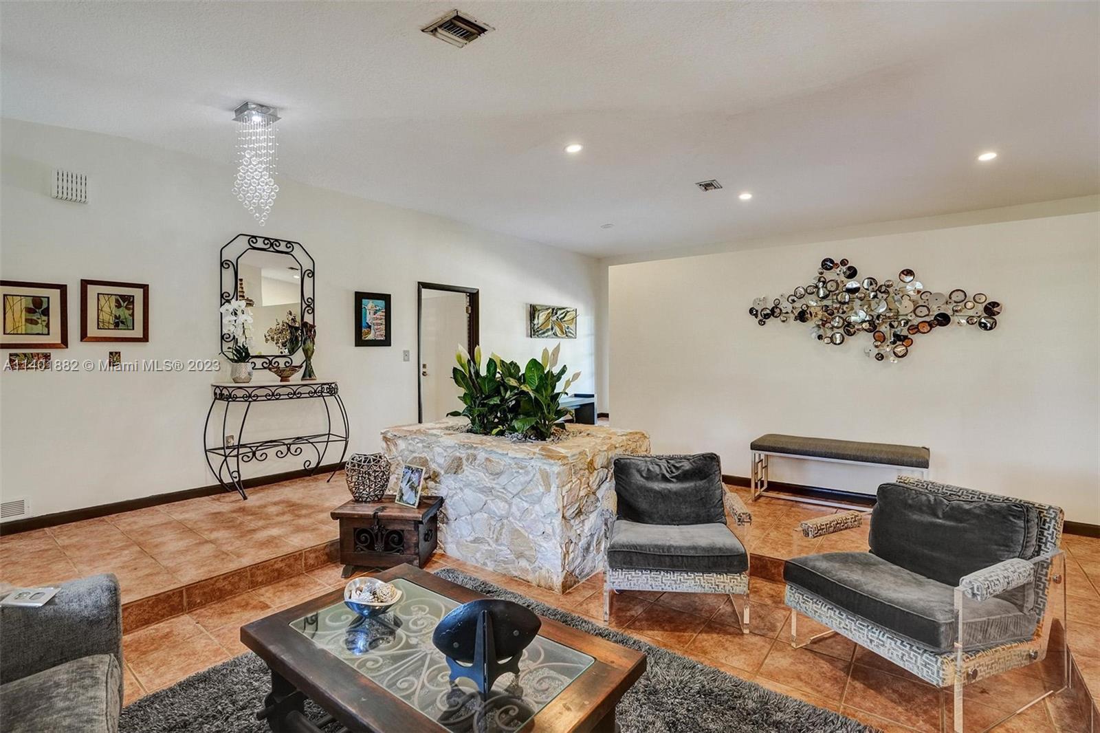 15971 Southwest 252nd Street Homestead, FL 33031 - Photo 13 of 92 a living room with furniture