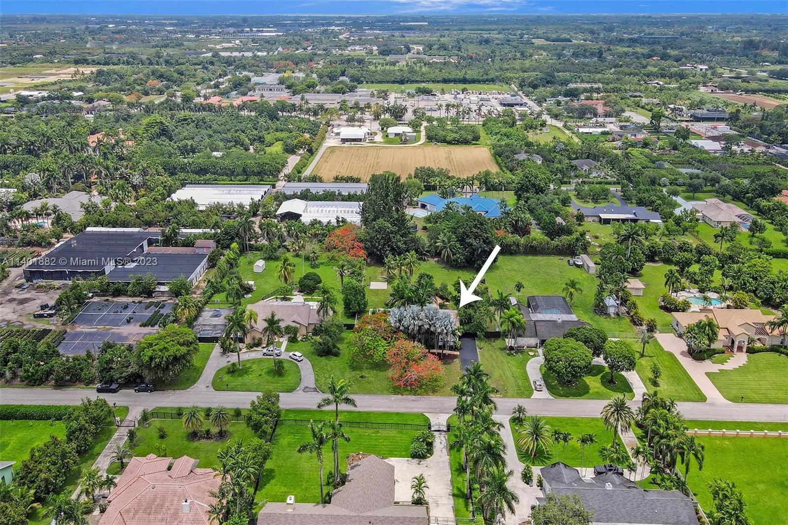 15971 Southwest 252nd Street Homestead, FL 33031 - Photo 81 of 92 an aerial view of multiple house