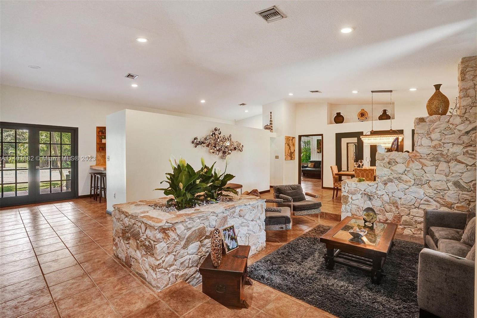 15971 Southwest 252nd Street Homestead, FL 33031 - Photo 9 of 92 a living room with furniture