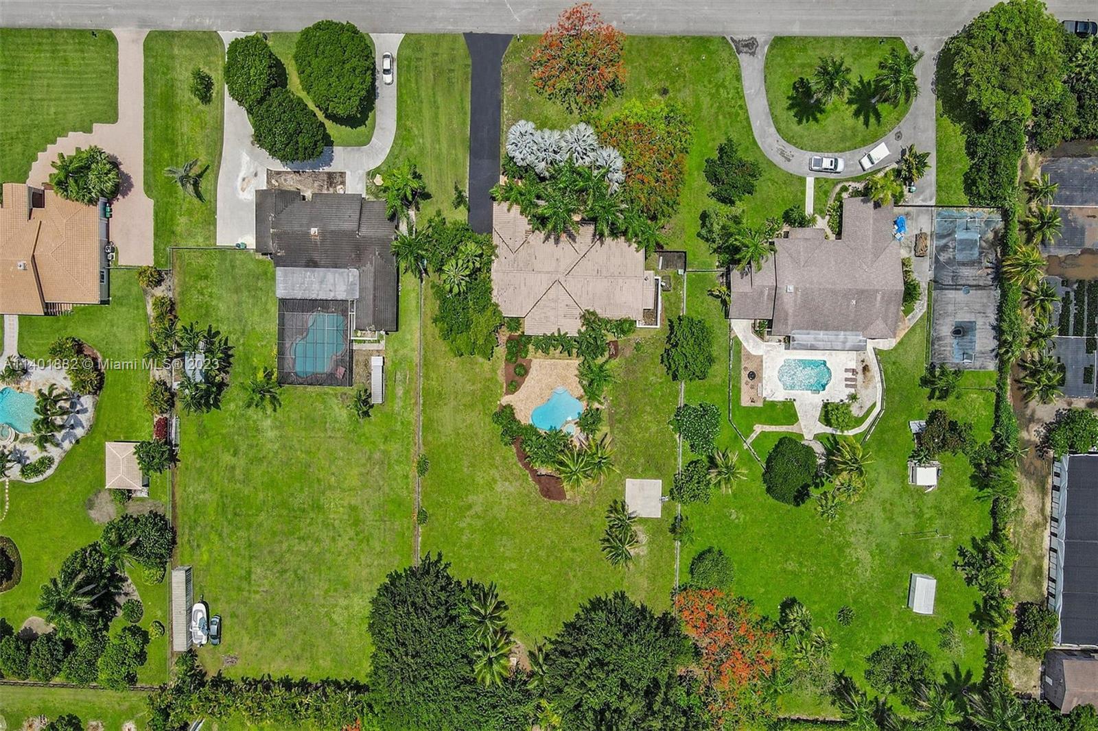 15971 Southwest 252nd Street Homestead, FL 33031 - Photo 91 of 92 an aerial view of a garden