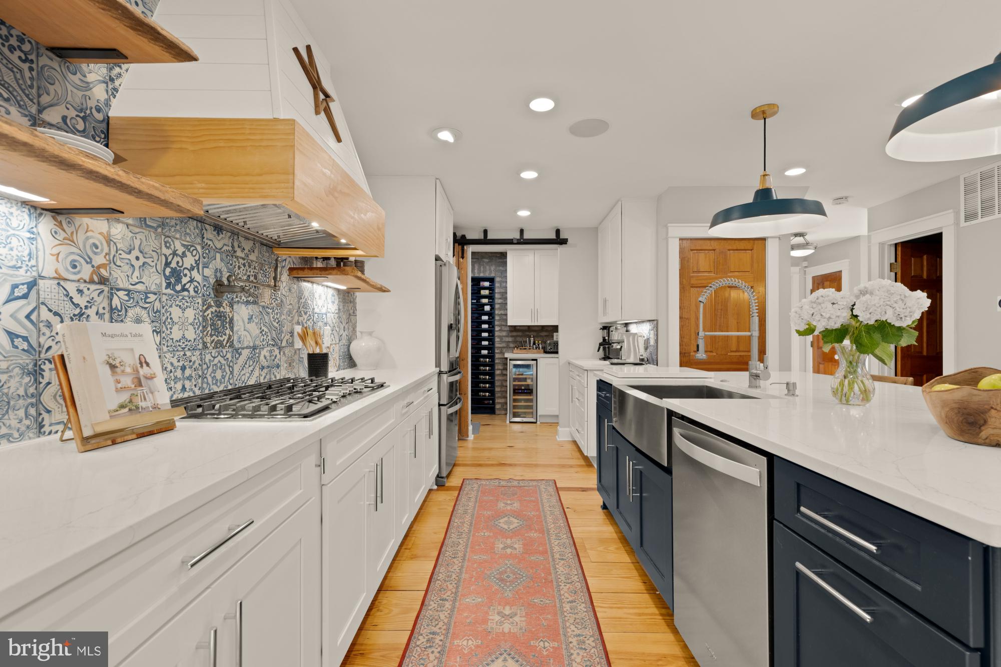 2429 Alsop Court Reston, VA 20191 - Photo 13 of 44 a large kitchen with stainless steel appliances granite countertop a sink and a stove