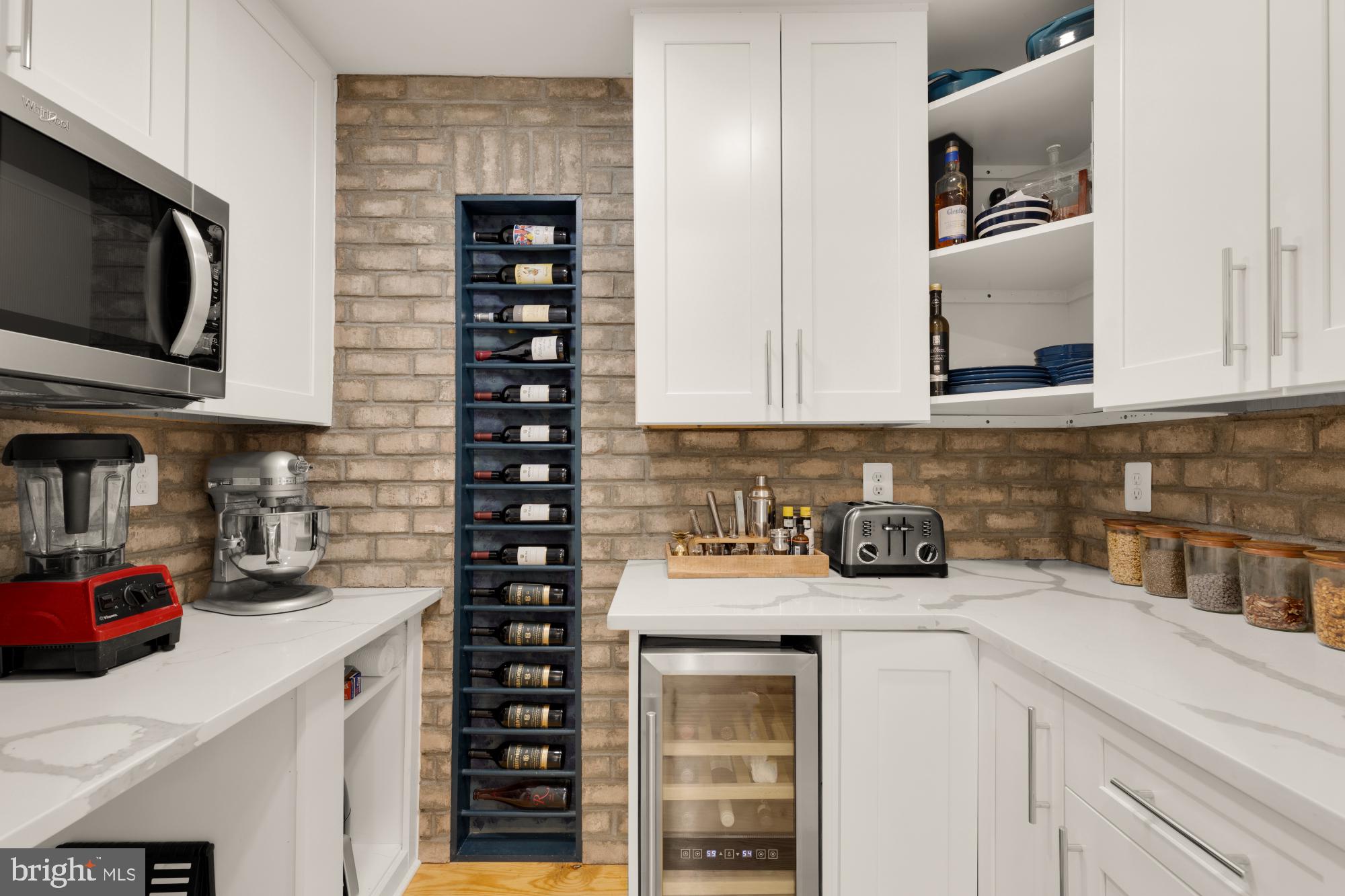 2429 Alsop Court Reston, VA 20191 - Photo 19 of 44 a kitchen with a sink and cabinets